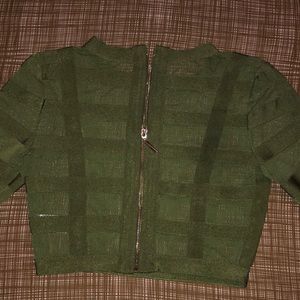It’s a See through jacket it’s a dark green size small it’s cute and comfortable